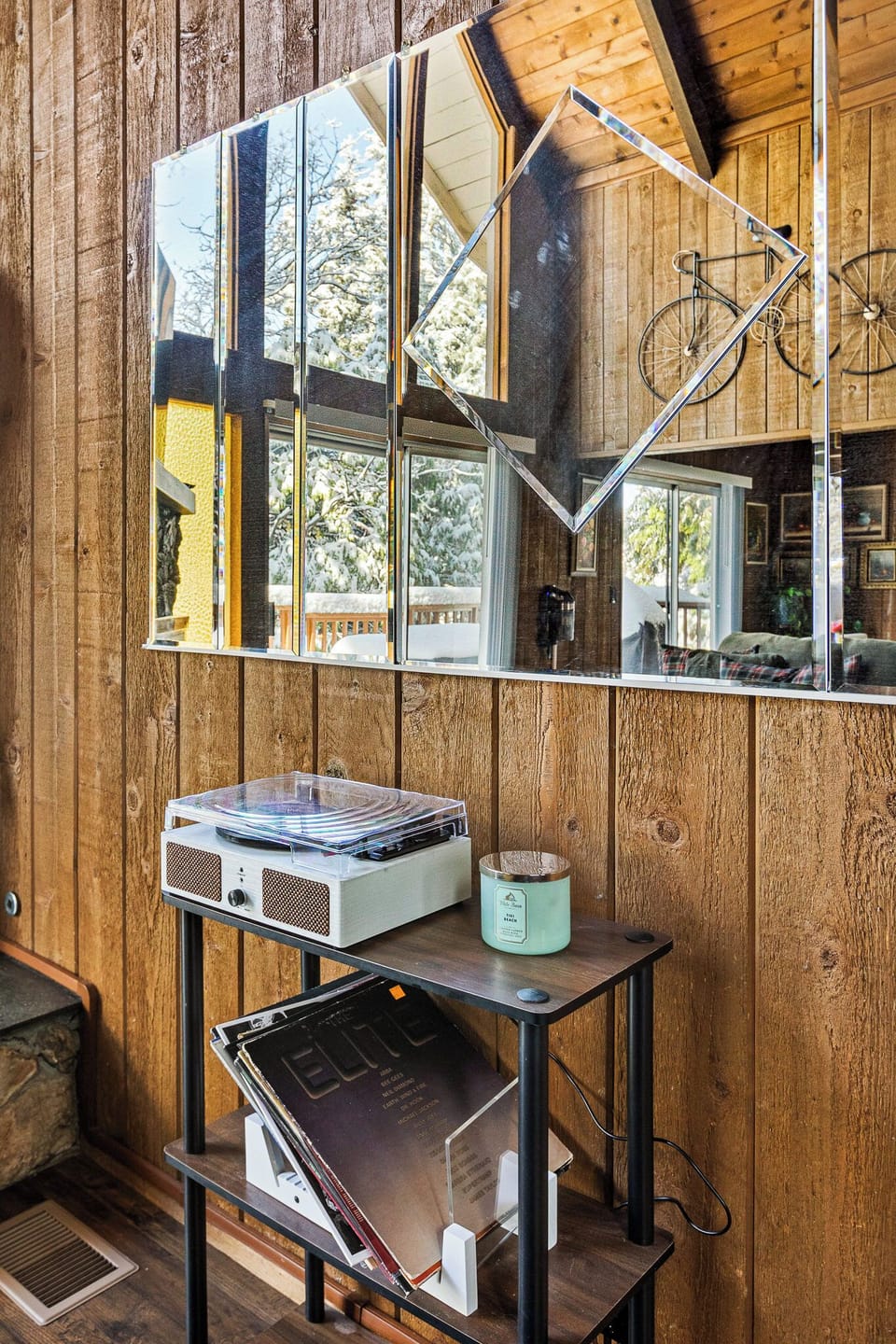 Living room vinyl record player with a stack of vinyl's to enjoy.