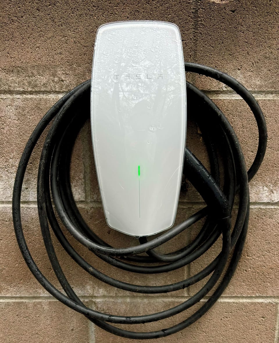 Tesla level 2 charger comes with SAE J1772 adapter so all EV vehicles can charge