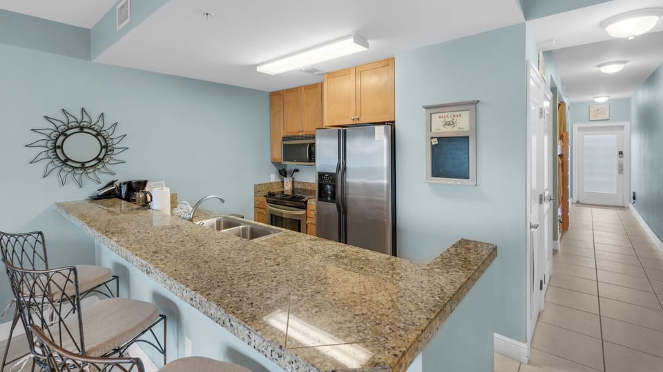 Condo, Multiple Beds, Balcony, Garden View (Cassine Station 302) | Private kitchen