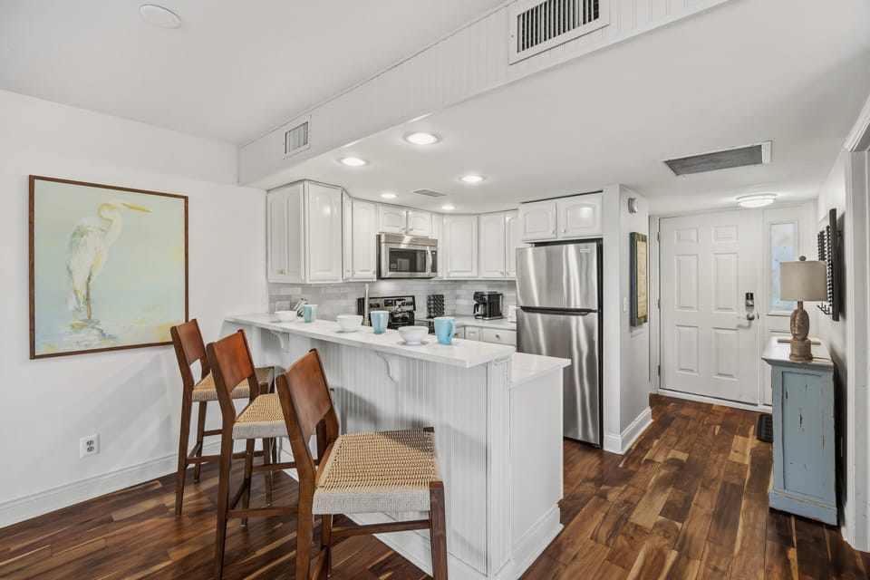 Fully Equipped Modern Kitchen + Bar Seating for 3