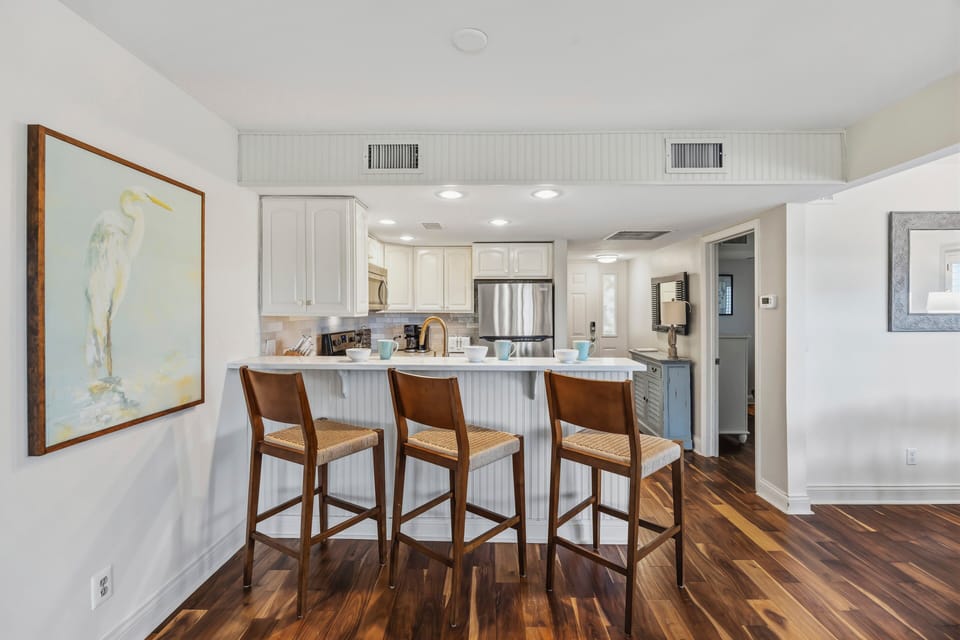 Fully Equipped Modern Kitchen + Bar Seating for 3