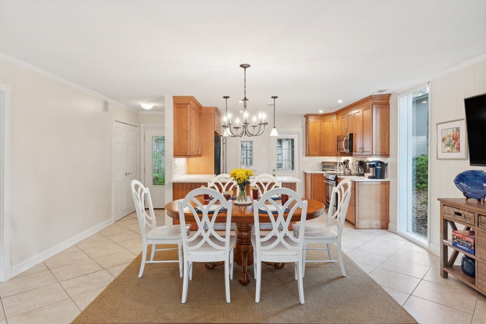 The open floor plan connects the living room, dining area, and kitchen, creating an inviting environment
