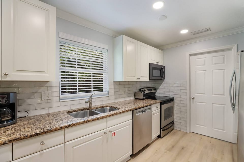 Kitchen with laundry room access