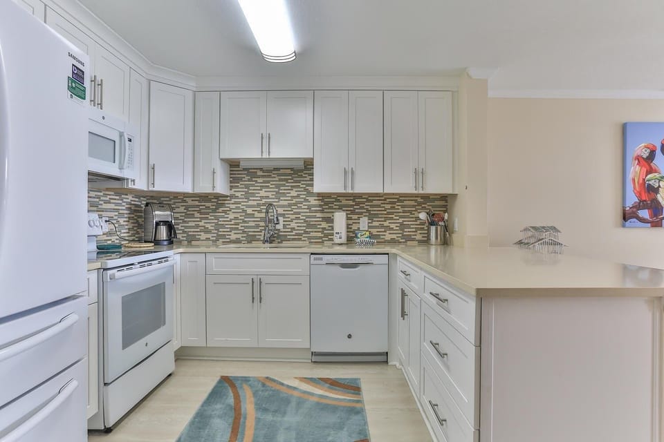 Condo, Multiple Beds, Bay View (Dolphin Point 402C) | Private kitchen | Oven, toaster