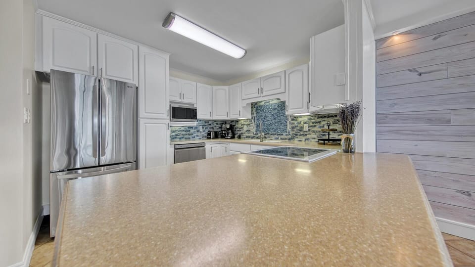 Condo, Multiple Beds, Bay View (Dolphin Point 502B) | Private kitchen | Oven, toaster