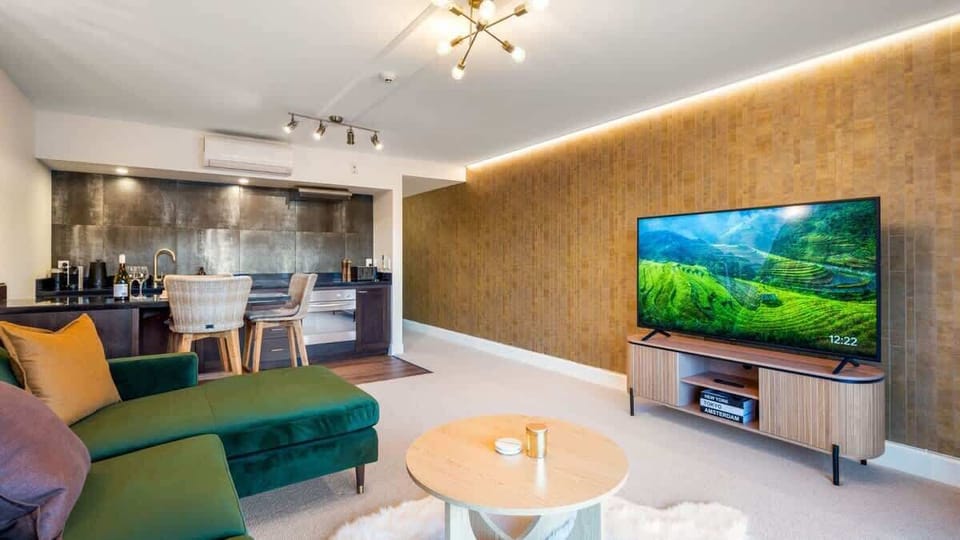 This spacious living area combines modern comfort with unmatched lake and mountain vistas, creating a perfect retreat.