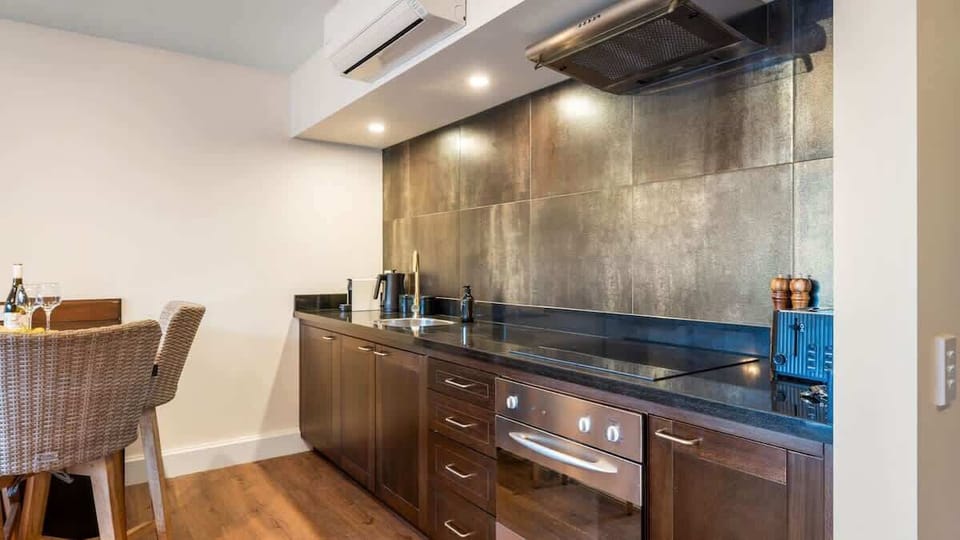 Experience culinary perfection in our modern, sleek kitchen at our self-contained accommodation in Queenstown, NZ
