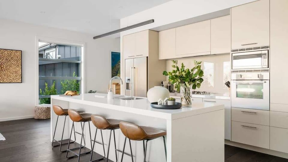 Modern Kitchen with High-End Finishes
Enjoy cooking in the beautifully designed kitchen, equipped with premium appliances, a Nespresso machine, and large windows that frame breathtaking views of the surrounding landscape.