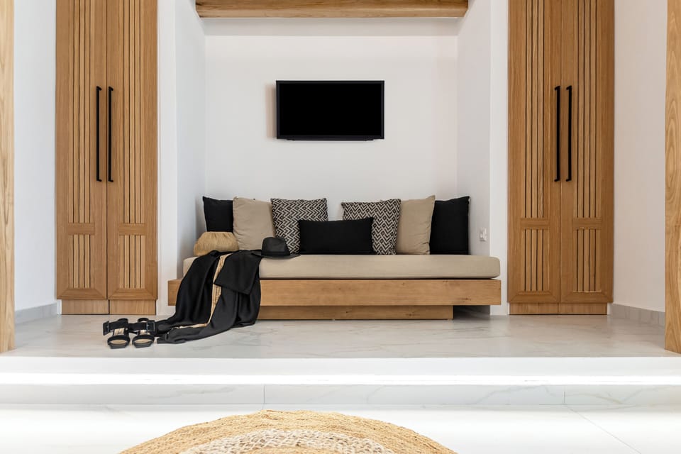 Family Double Room | Living area | 50-inch Smart TV with digital channels