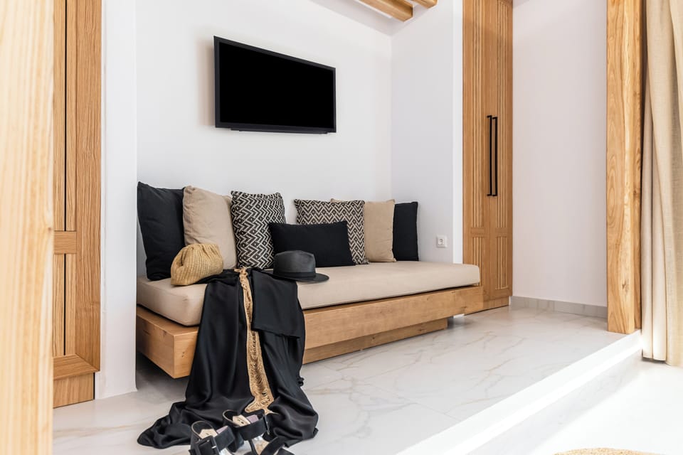 Family Double Room | Living area | 50-inch Smart TV with digital channels