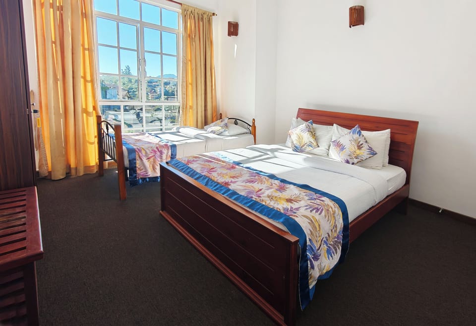 Deluxe Triple Room | 1 bedroom, in-room safe, free WiFi