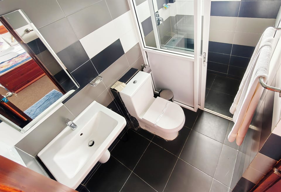 Deluxe Triple Room | Bathroom | Bidet