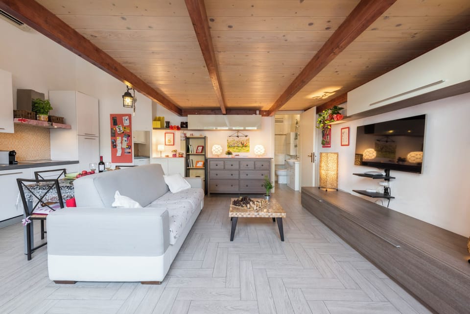 City Apartment | Living area | 40-inch flat-screen TV with digital channels