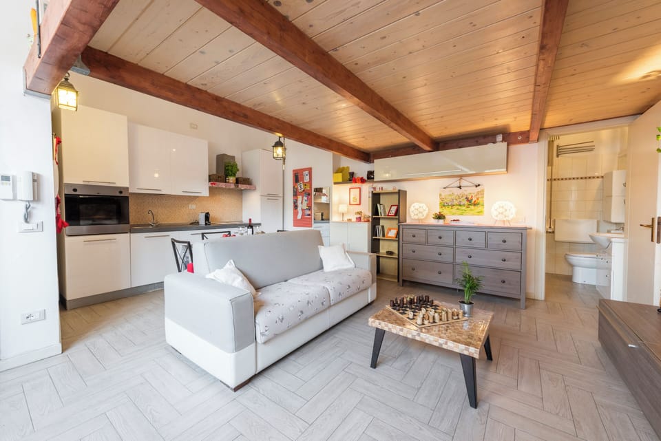 City Apartment | Living area | 40-inch flat-screen TV with digital channels