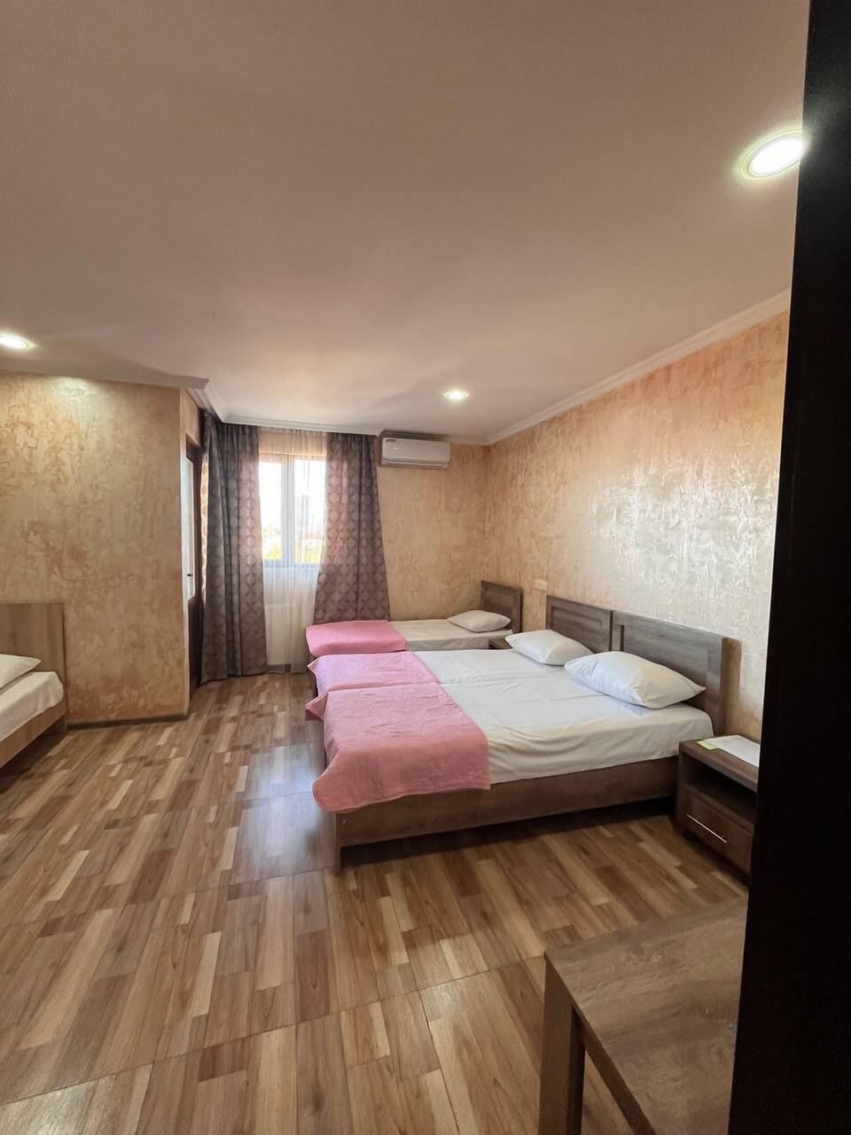 Basic Quadruple Room | Premium bedding, blackout drapes, soundproofing, iron/ironing board