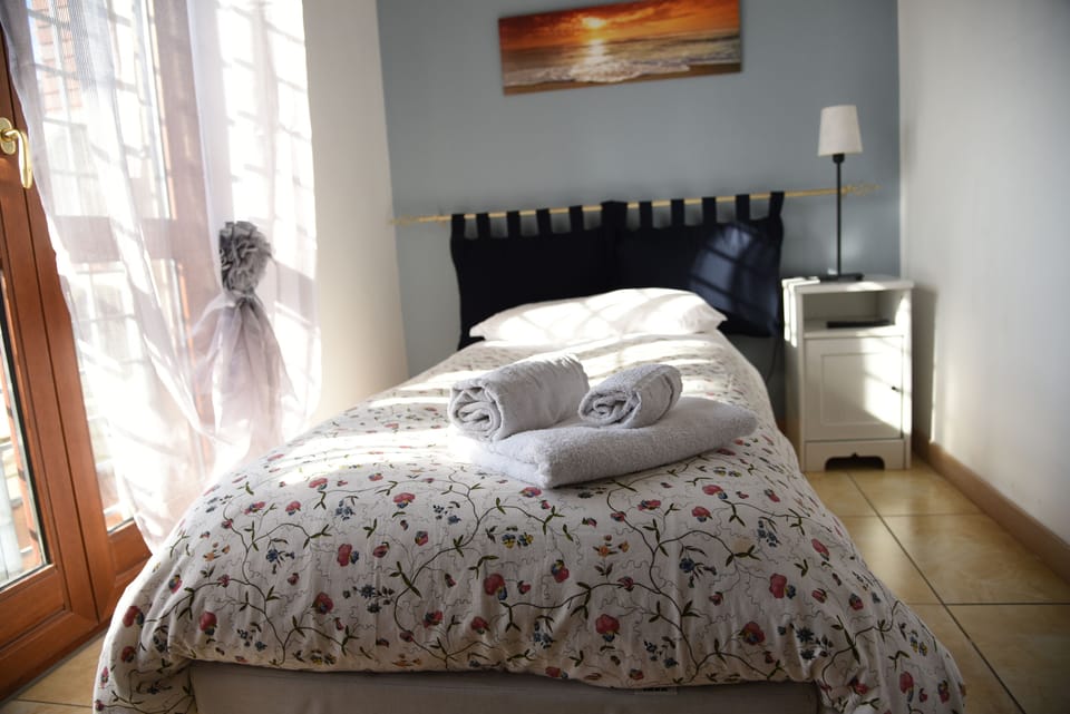 1 bedroom, down comforters, desk, WiFi (free)