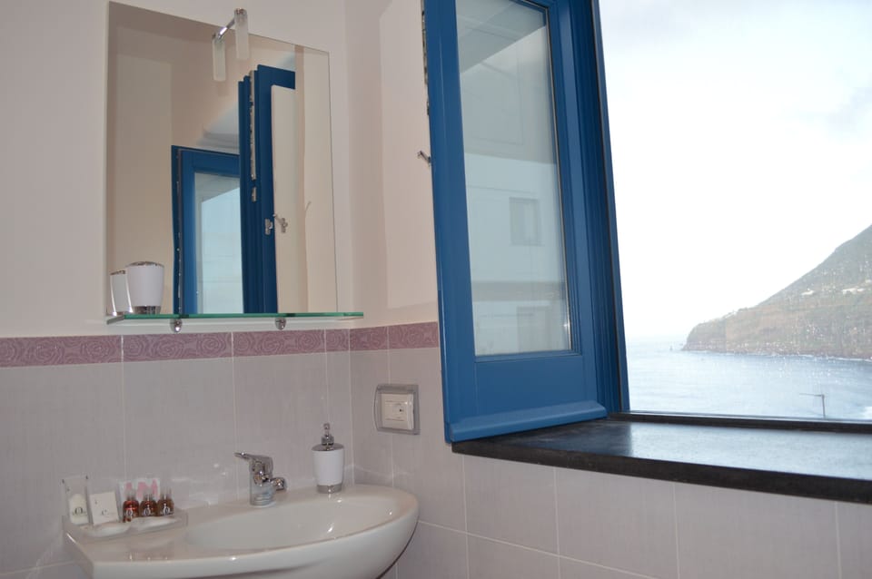 Deluxe Double Room, Balcony, Sea View | Bathroom | Shower, free toiletries, hair dryer, towels
