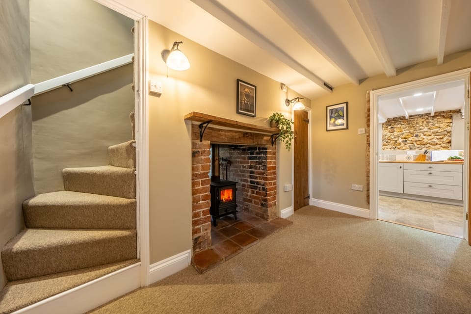 Ground floor: From the dining room a steep Norfolk winder stair way to the first floor