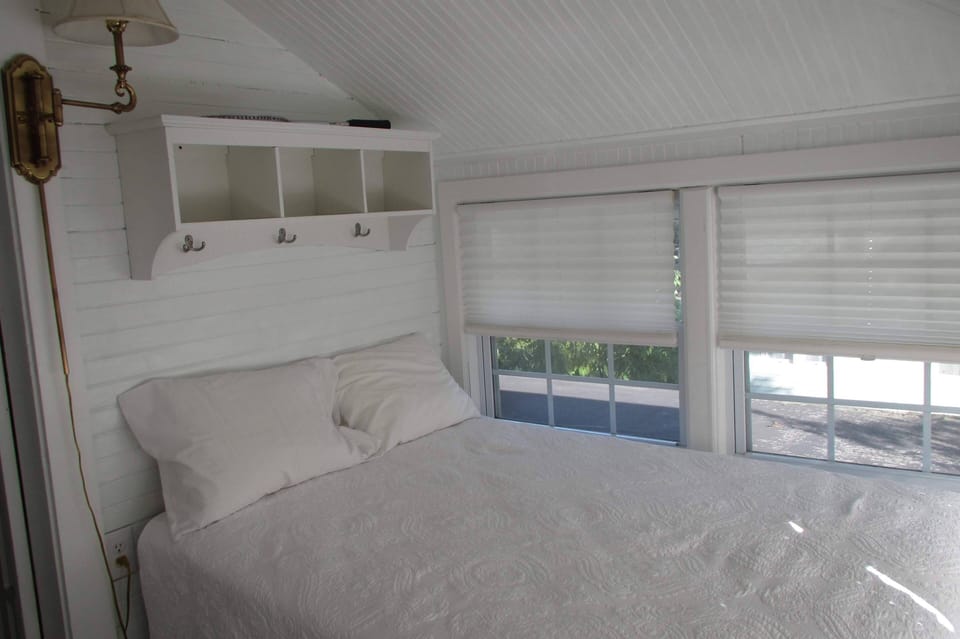 Upstairs bedroom 3 (sleeping porch, connects via upstairs bedroom 2, 2 doubles)