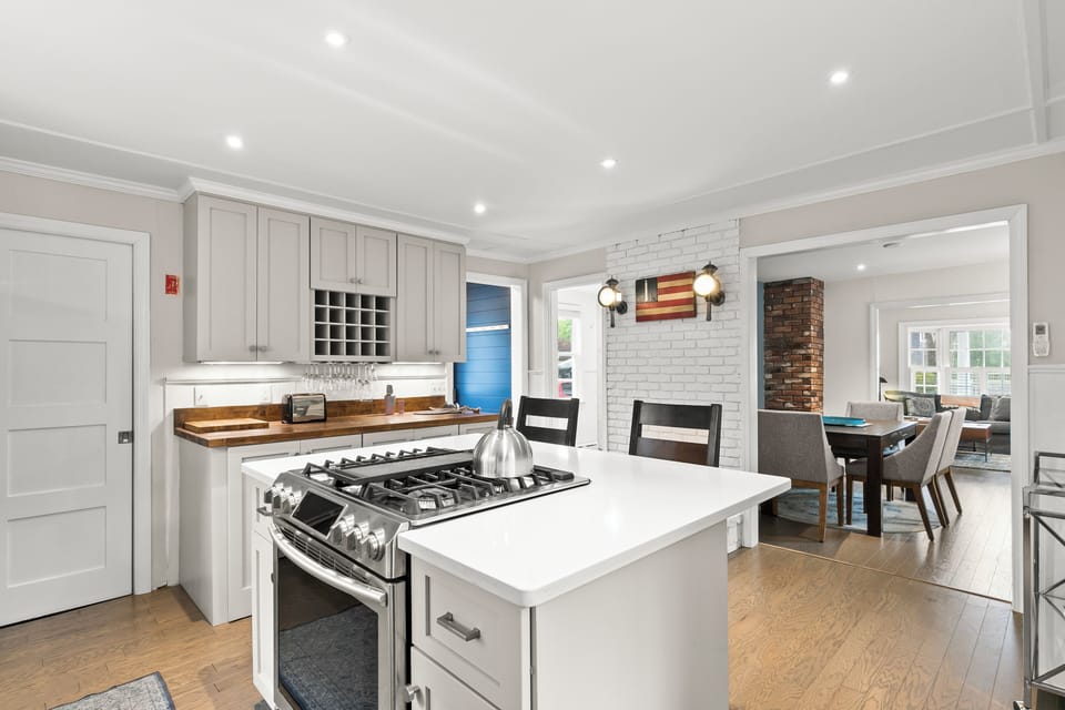 Stylish kitchen with ample space, easy cleanup with dishwasher.
