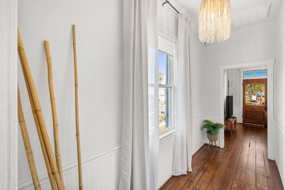 Charming entry with natural light and minimal decor.