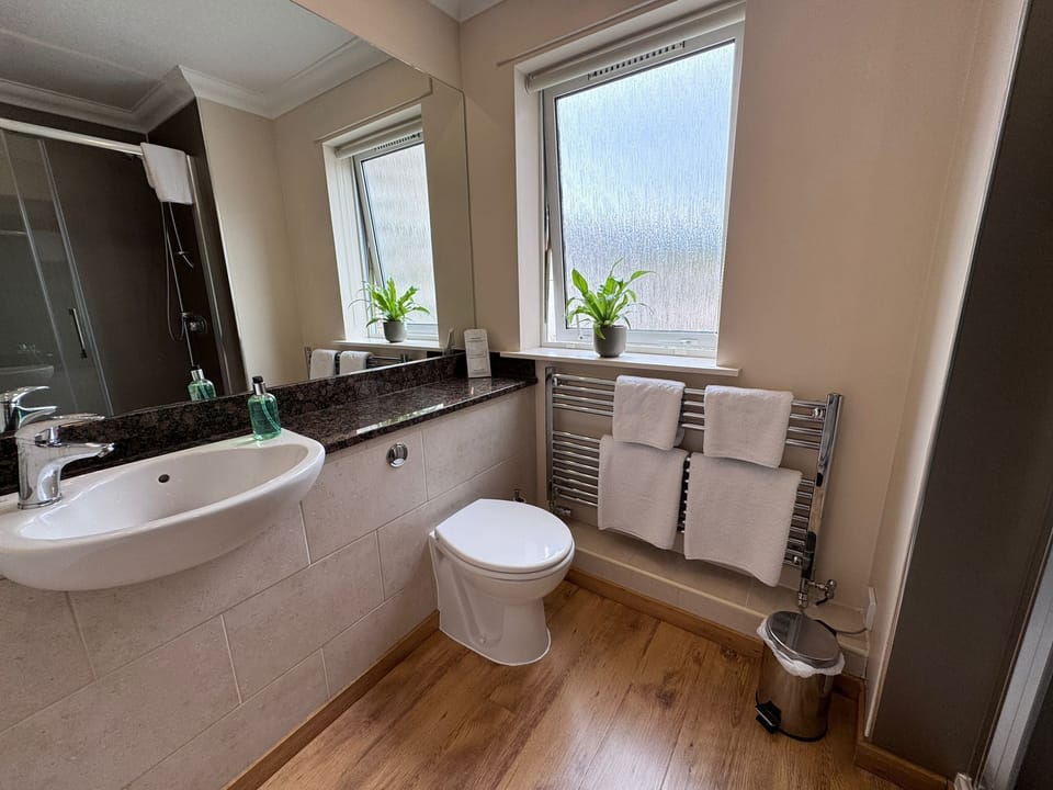 Junior Suite, Valley View | Bathroom | Shower, hair dryer, slippers, towels