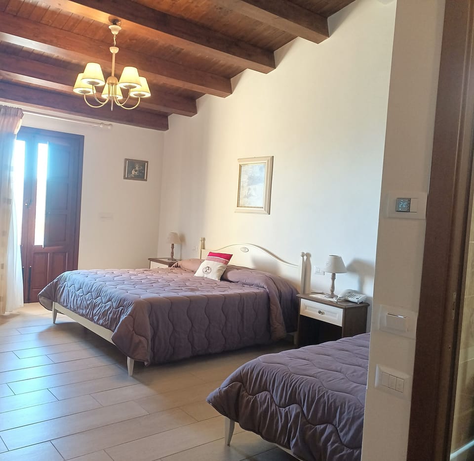 Traditional Triple Room, Sea View | Hypo-allergenic bedding, minibar, desk, free WiFi