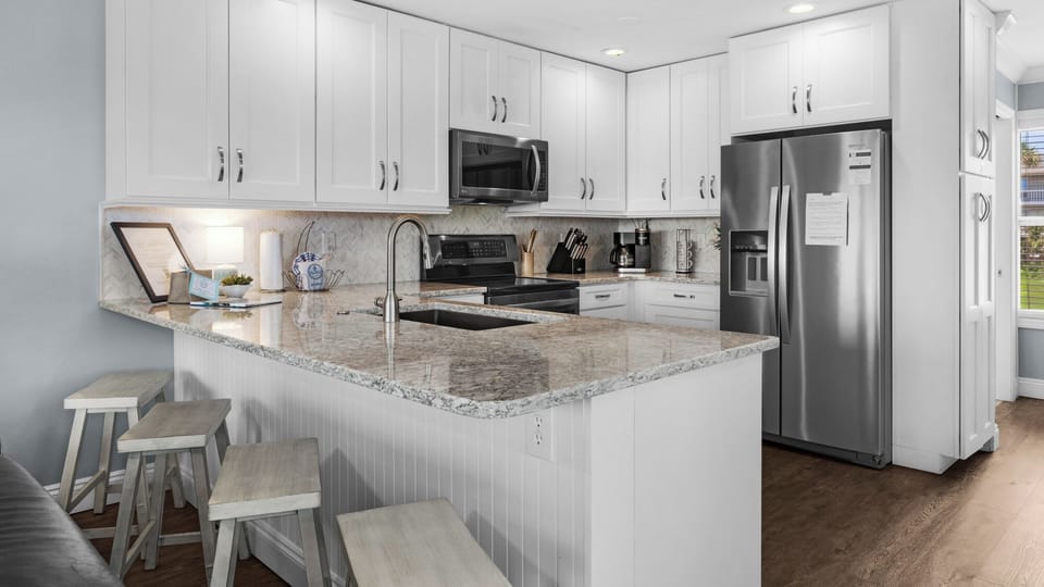 Townhome, Multiple Beds, Patio, Ocean View (Sea Haunts 1A) | Private kitchen | Dining tables