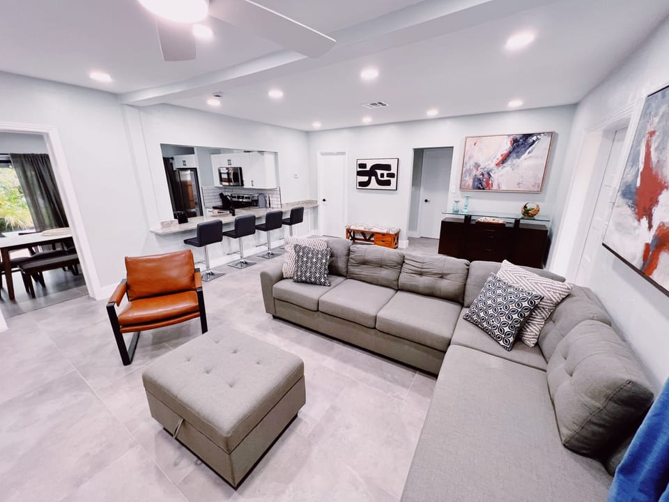 Our Living Room

Equipped with plenty of sunlight a large sectional and even bigger TV to keep you entertained through your stay. The living room is spacious for all sorts of groups.