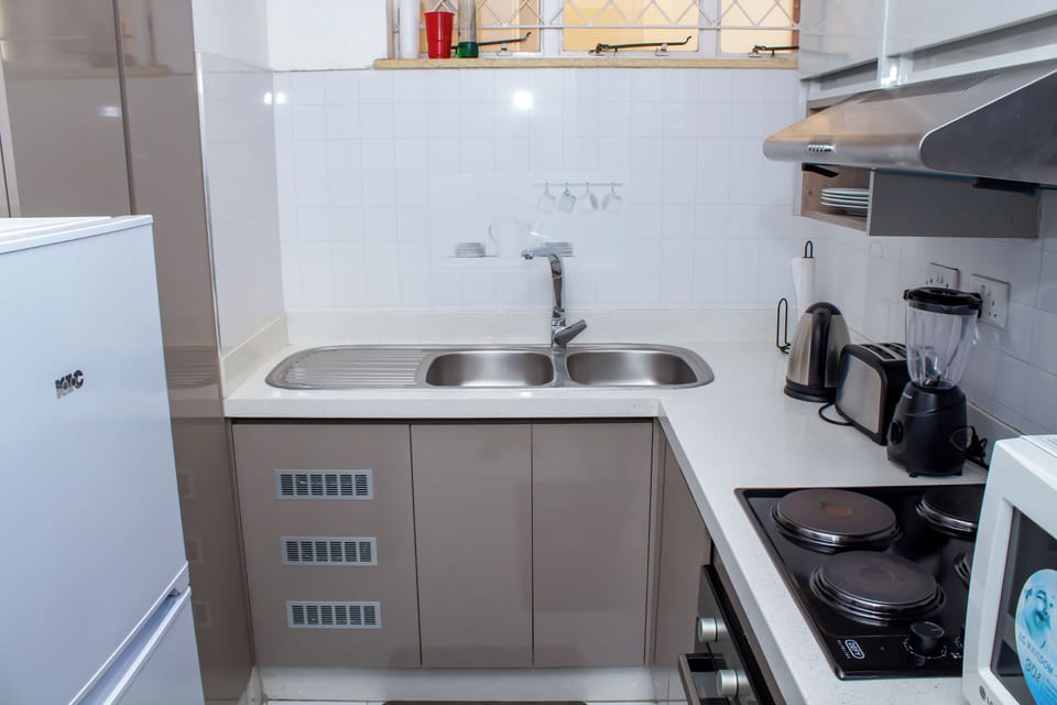 Apartment | Private kitchen | Fridge, microwave, oven, stovetop