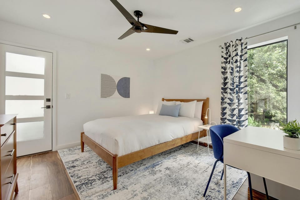 Guest Bedroom #2 with queen bed, en suite bathroom and balcony