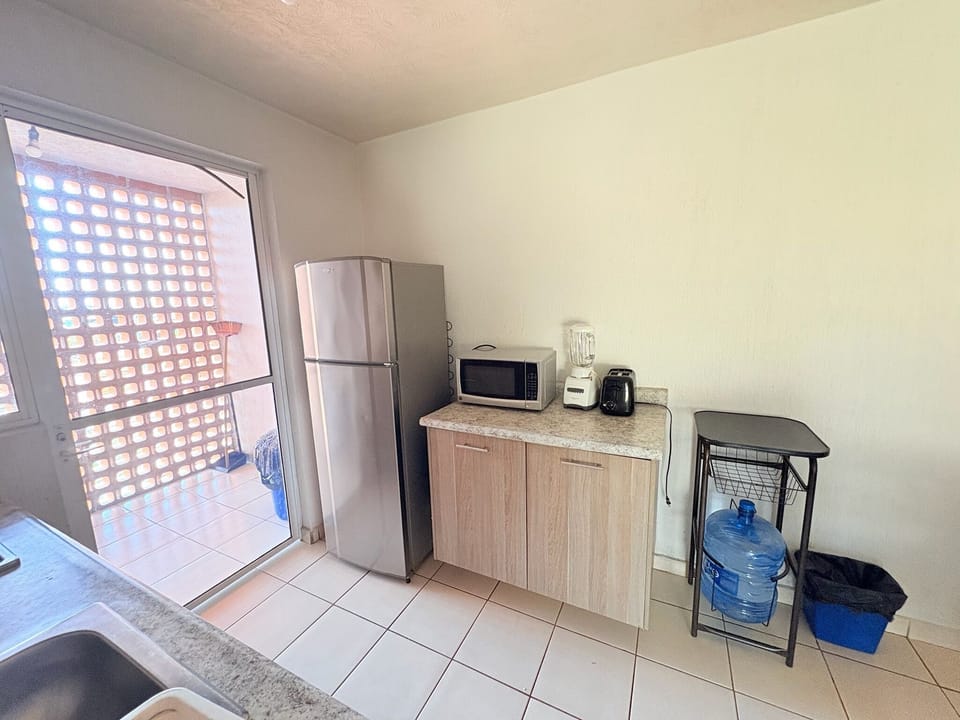 Fridge, microwave, dishwasher, coffee/tea maker