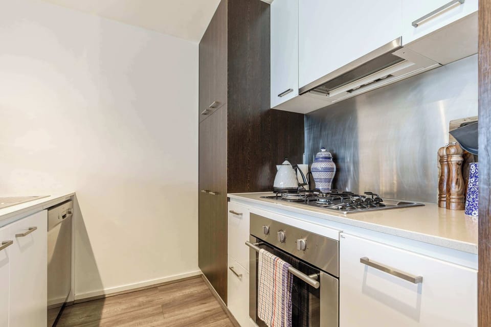 KITCHEN: A fully equipped modern kitchen with everything you need to cook, sip, and savour in style. Perfect for slow mornings or effortless dinners at home.