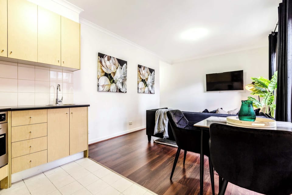 Living Room, Dining and Kitchenette at Monet: Stylish and cozy apartment with modern décor, a spacious living area, and a fully equipped kitchen, perfect for relaxing or entertaining during your stay