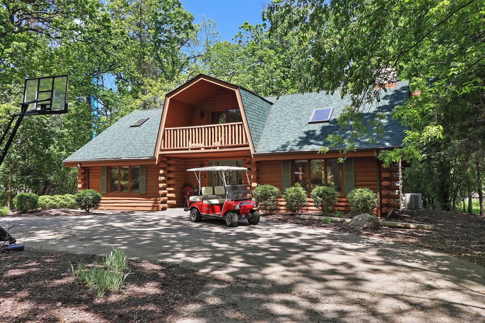 Front of home featuring golf cart transportation!