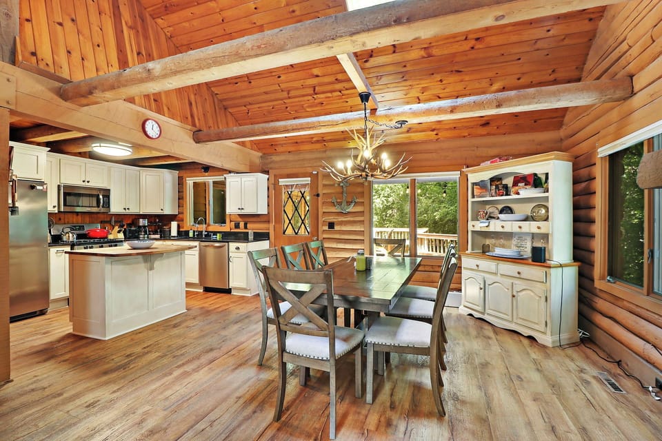 Kitchen opening up to dining area