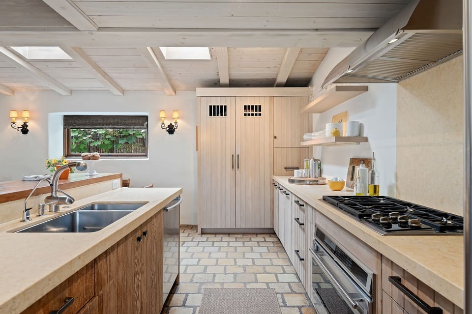 Fully equipped kitchen with stainless steel appliances