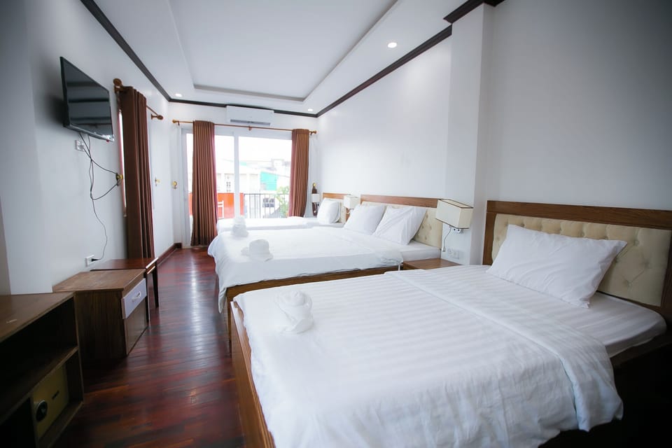 Deluxe Quadruple Room | Bed sheets