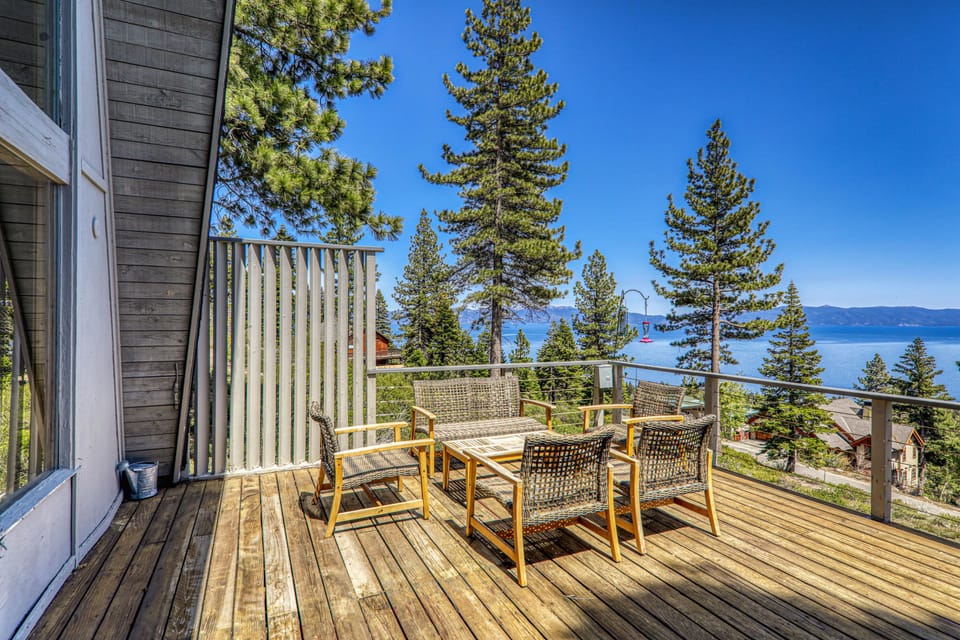 A spacious deck offers the perfect place to soak up the sun and take in the panoramic lake views.