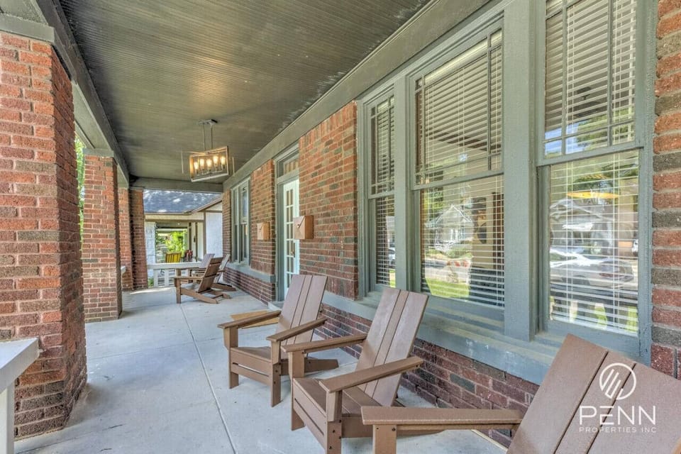Relax on the charming front porch, the perfect spot to sip coffee and enjoy the neighborhood.