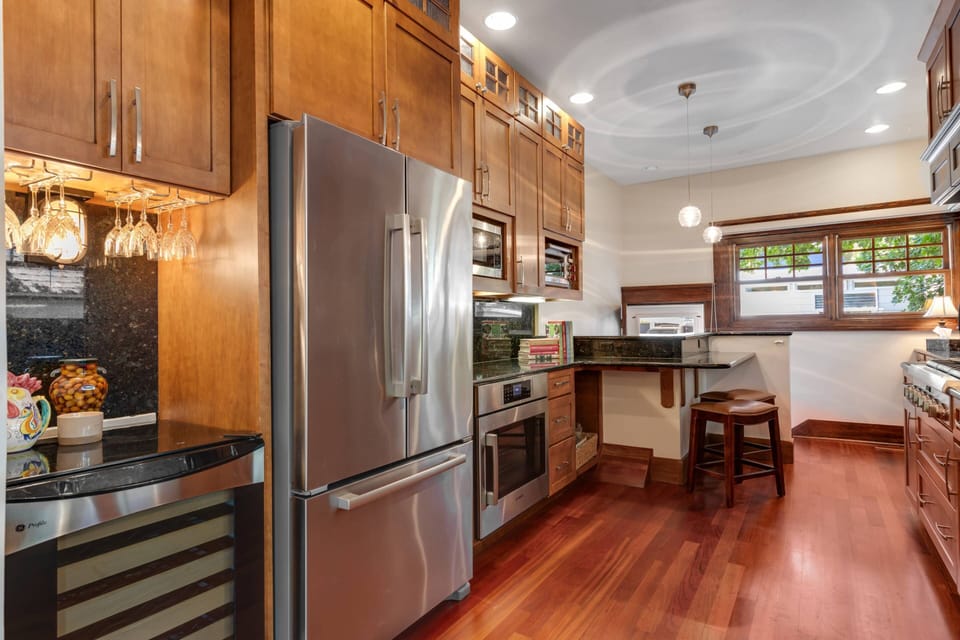 Enjoy the professional suite of Thermador® and Bosch® appliances in the gourmet kitchen.