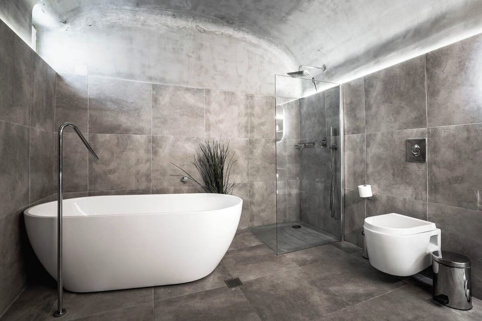 Bathroom with shower and bath tub