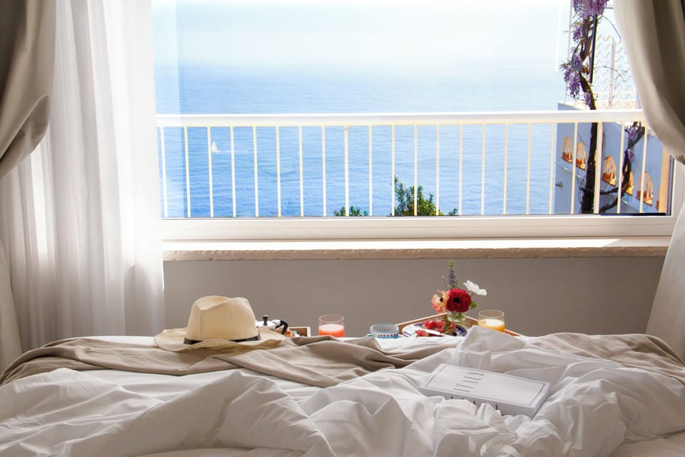 Panoramic Double Room, Balcony, Sea View | Minibar, in-room safe, blackout drapes, soundproofing