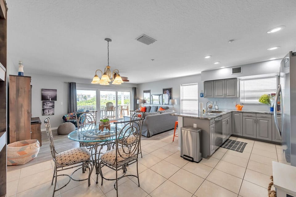 Open-concept living, dining & kitchen space designed for easy gathering.