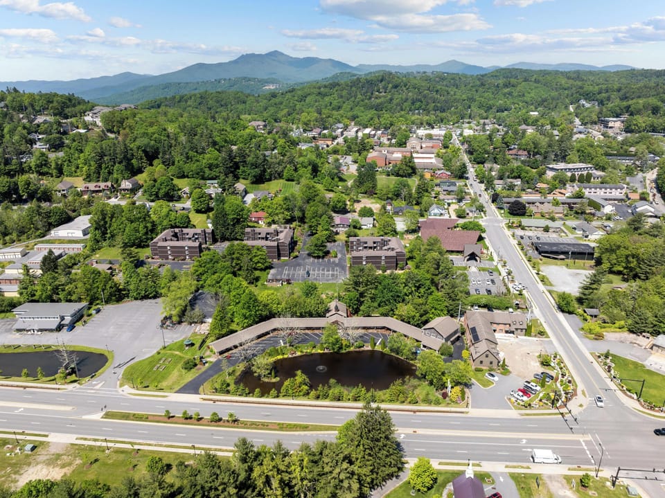 View of Hwy 321 and Sunset Dr. - complex is brown buildings mid-photo. 