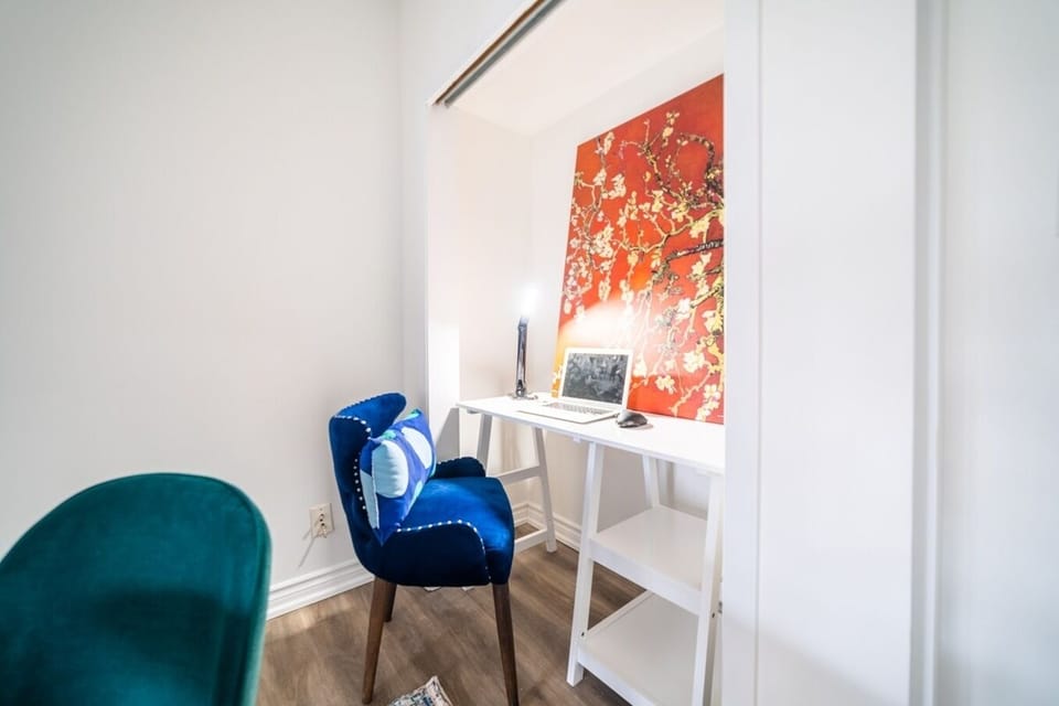 Enjoy a small work station in your room. A quaint work from home setting.
