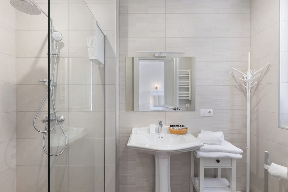 Shower, free toiletries, hair dryer, bathrobes