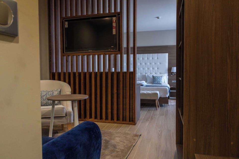 Premium bedding, minibar, desk, laptop workspace