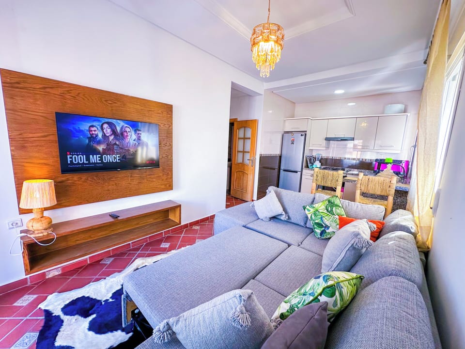 Comfort Apartment | Living area | Flat-screen TV