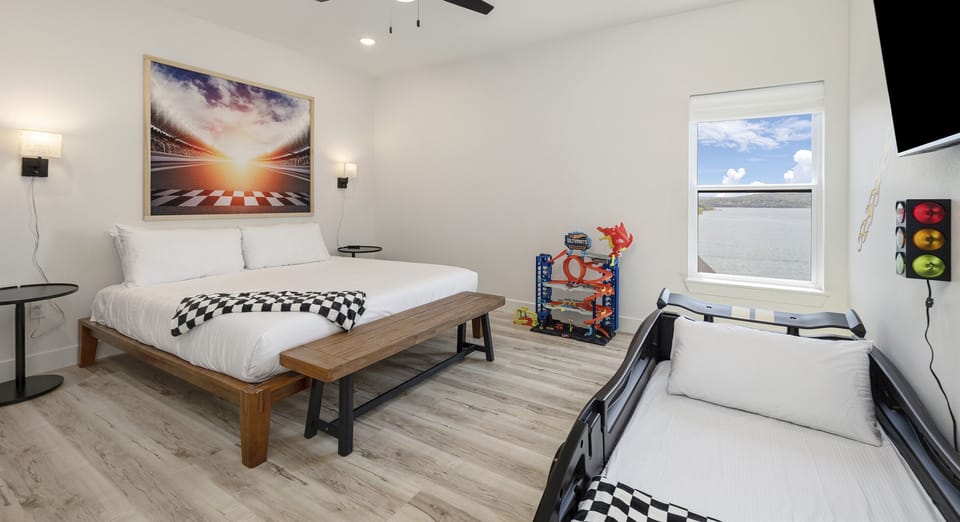 Sports Suite - Upper Level: Bedroom 7 w/ king bed, a race-car bed with twin bed, and ensuite bathroom